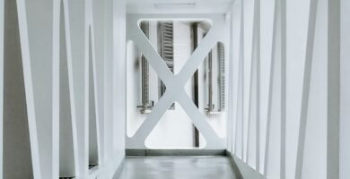 white painted building hallway